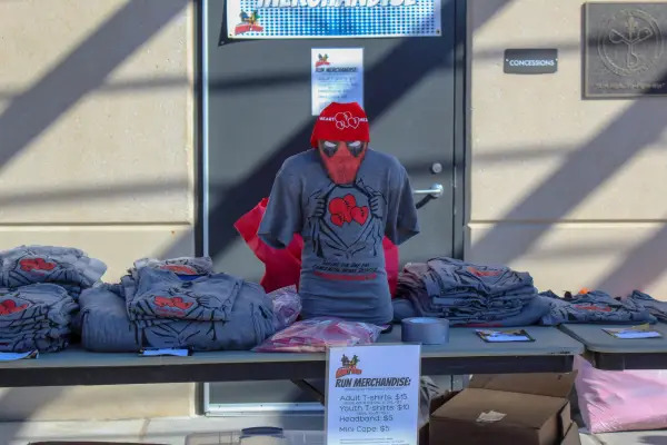 table with t-shirts on it